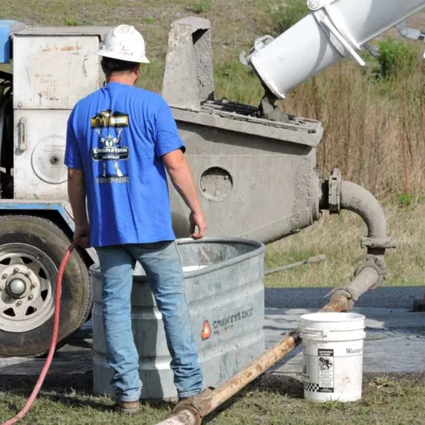 Sinkhole Titan on the job filling with concrete