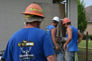 Sinkhole Titan employee's at work on a foundation repair
